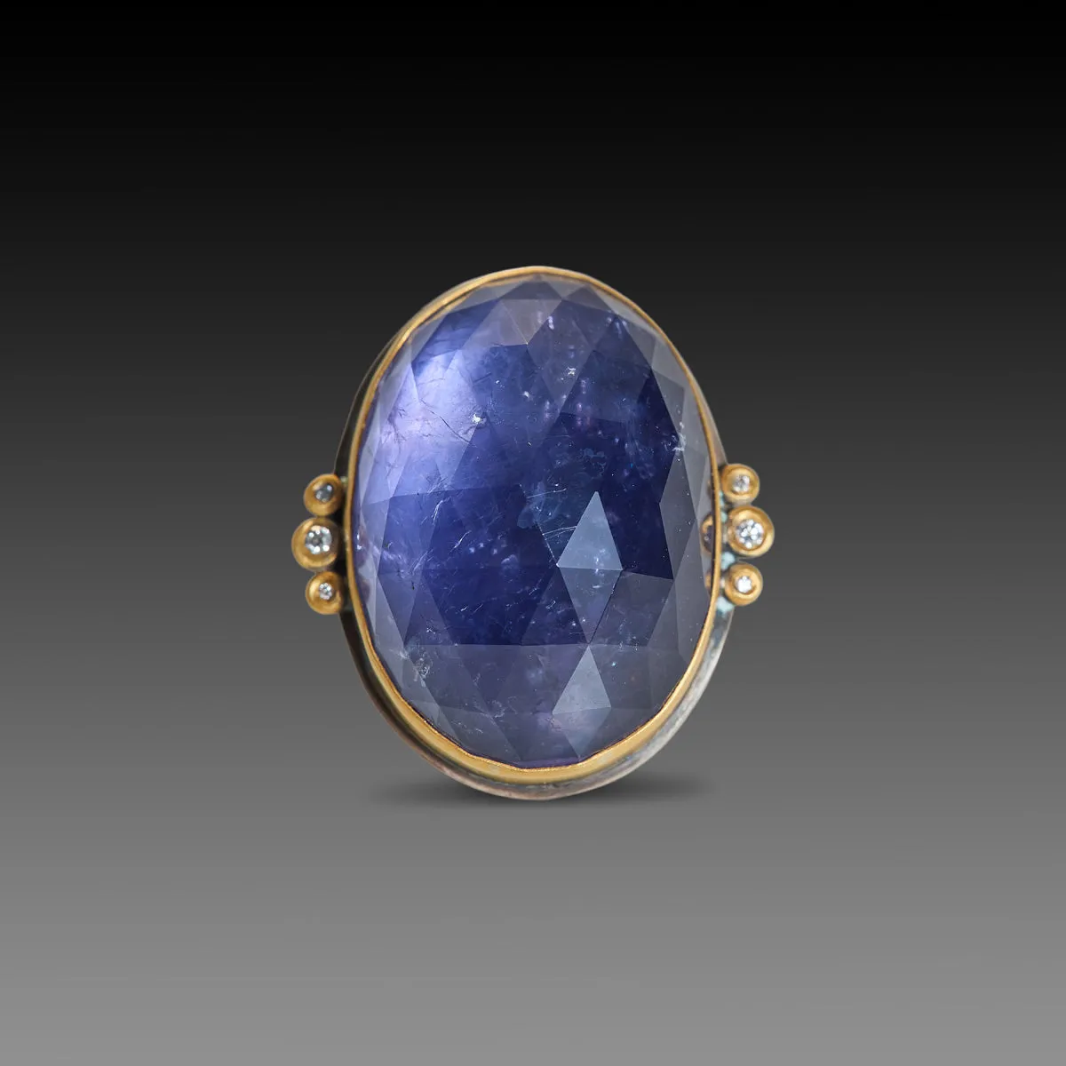 Oval Iolite Ring with Diamond Trios