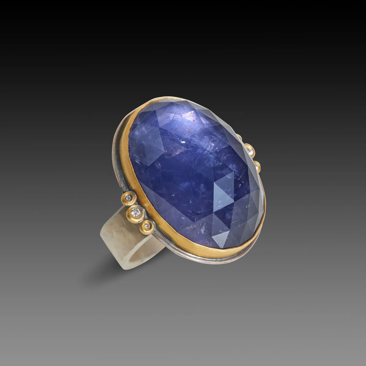 Oval Iolite Ring with Diamond Trios