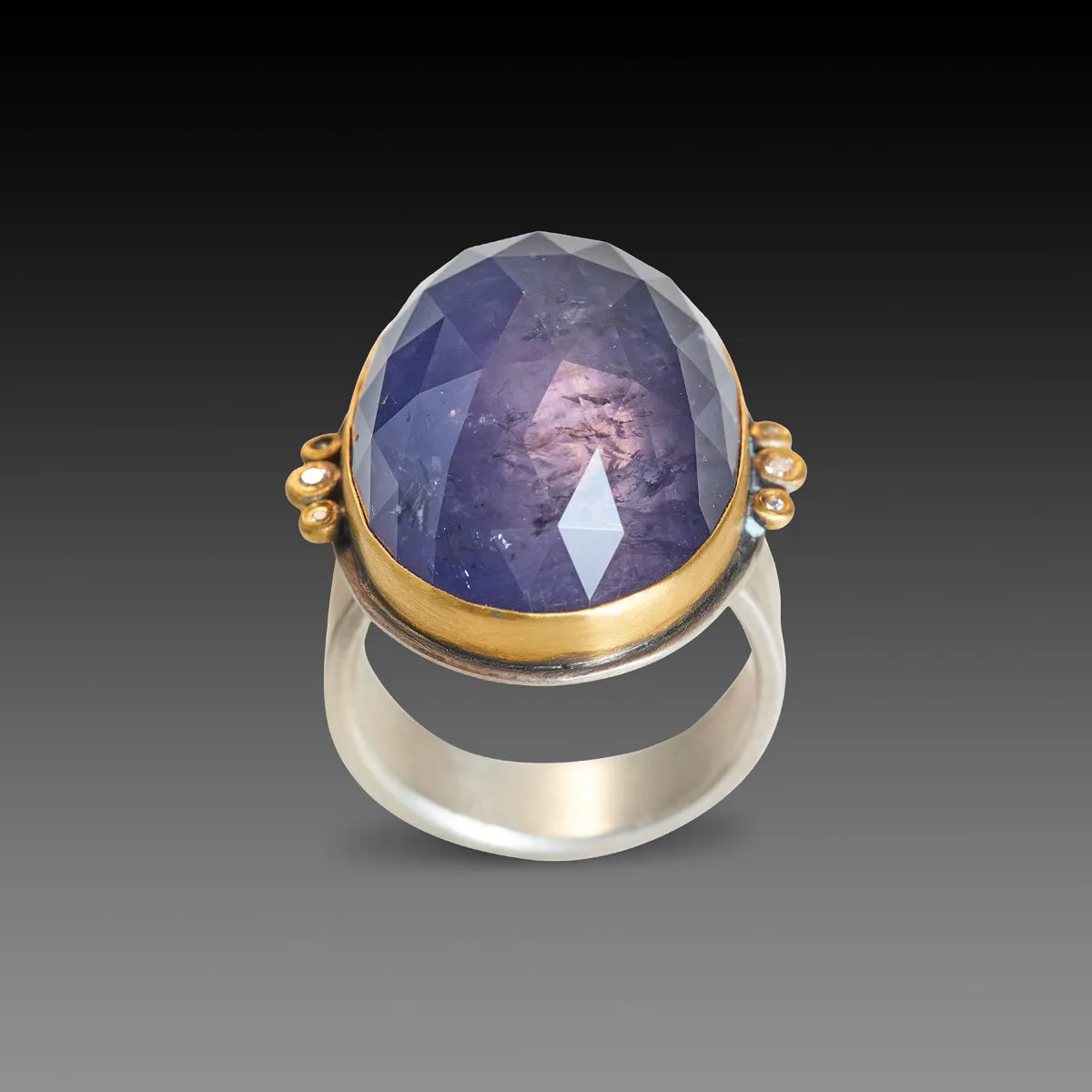 Oval Iolite Ring with Diamond Trios